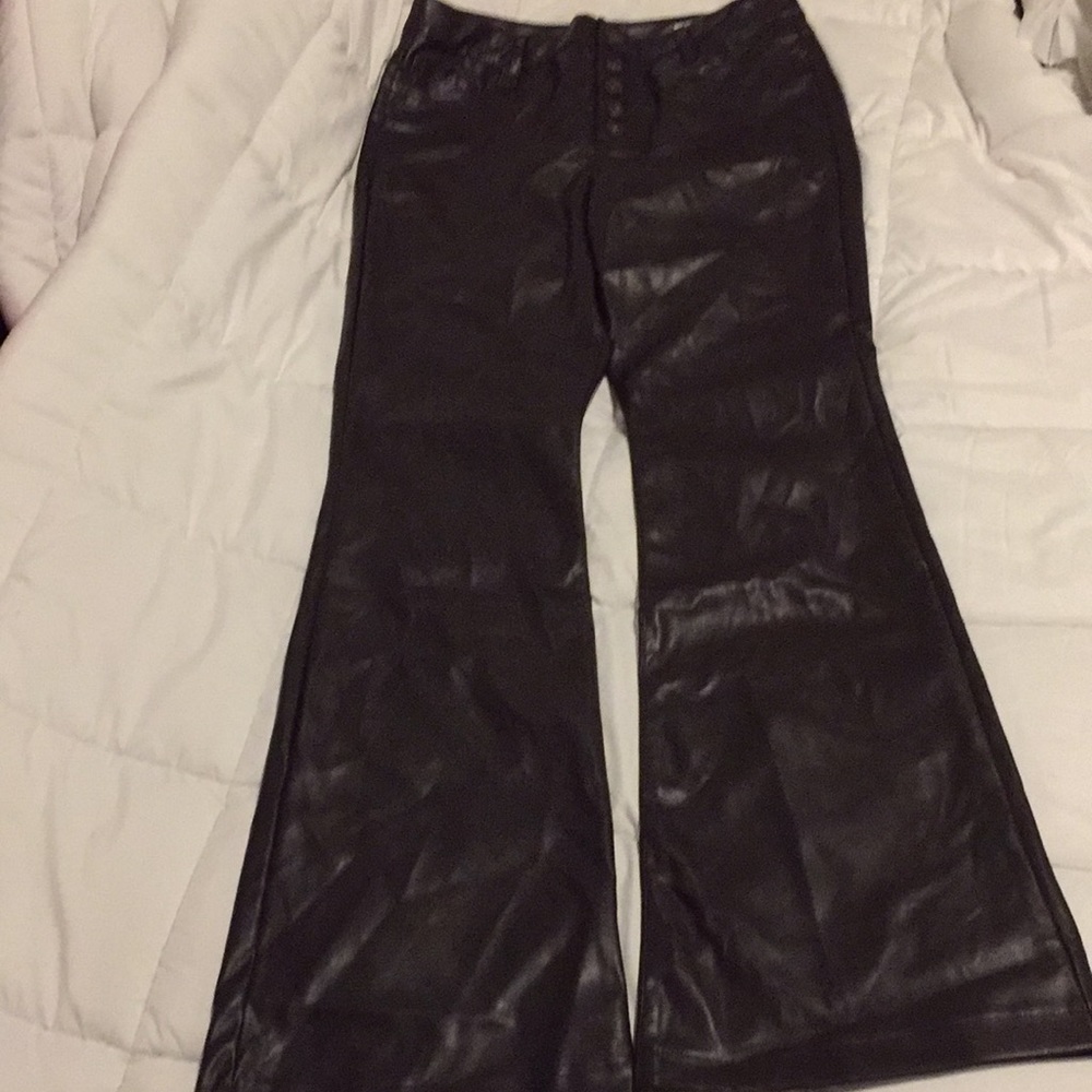 Sofia Vergara faux leather flare pants